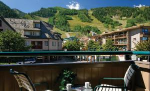 a balcony with a view of a mountain at Aspen Square Condominium Hotel in Aspen