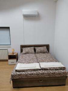 Krevet ili kreveti u jedinici u okviru objekta Apartmani Jasa