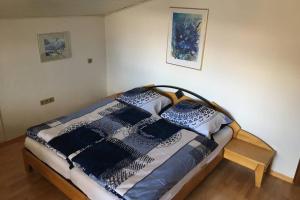 Postel nebo postele na pokoji v ubytování Ferienwohnung Appartement Am Schilf XL