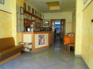 Kuchyň nebo kuchyňský kout v ubytování Hotel Dolly