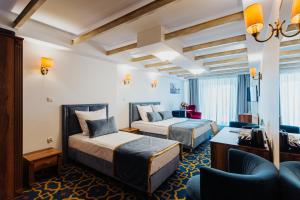 Postel nebo postele na pokoji v ubytování Hotel Jan + 37 fotografií