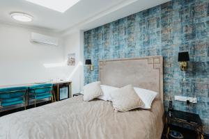 Postel nebo postele na pokoji v ubytování Hotel Jan