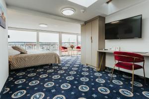 TV a/nebo společenská místnost v ubytování Hotel Jan