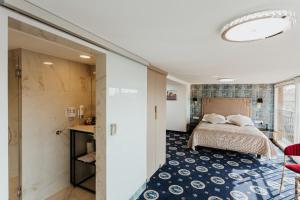 Postel nebo postele na pokoji v ubytování Hotel Jan