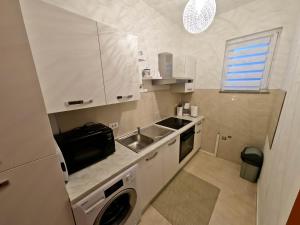 Kuchyň nebo kuchyňský kout v ubytování House Monte Cherpo