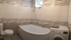Koupelna v ubytování Tölgyerdő Apartman