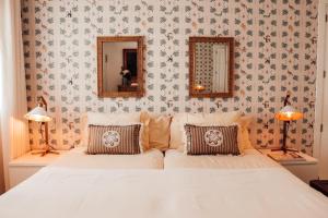 Cama ou camas em um quarto em Villa Piccola by Cassai