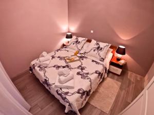 Postel nebo postele na pokoji v ubytování House Monte Cherpo