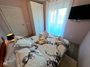 Postel nebo postele na pokoji v ubytování House Monte Cherpo