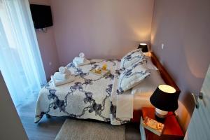 Postel nebo postele na pokoji v ubytování House Monte Cherpo