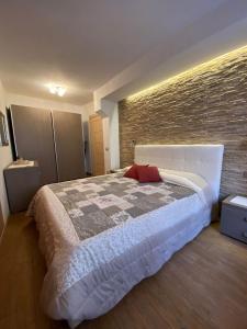 Katil atau katil-katil dalam bilik di Appartamenti Lucia