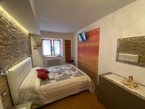Postel nebo postele na pokoji v ubytování Appartamenti Lucia