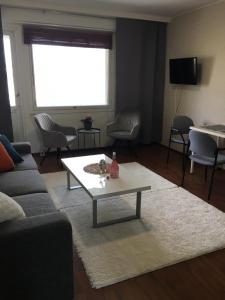 Телевизор и/или развлекательный центр в StarHomes City Apartment 48 +12 фотографий