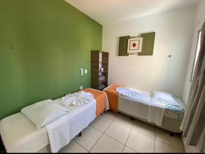 Voodi või voodid majutusasutuse Sanches Hotel toas