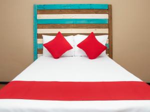 Postel nebo postele na pokoji v ubytování Hotel Allende 104