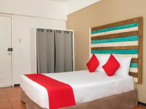 Postel nebo postele na pokoji v ubytování Hotel Allende 104