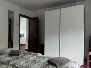 Uma cama ou camas num quarto em Appartement "Luigi Loft"
