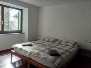 Rúm í herbergi á Appartement "Luigi Loft"