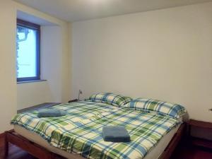 Uma cama ou camas num quarto em Appartement "Luigi Loft"