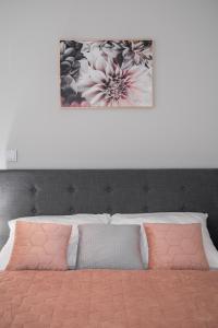 Posteľ alebo postele v izbe v ubytovaní Flow Apartments Toruń