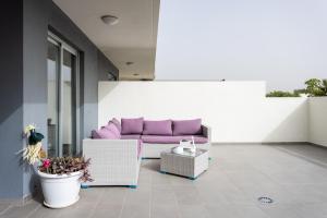Posezení v ubytování Eden Rentals Maday Home