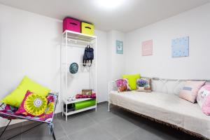 Posezení v ubytování Eden Rentals Maday Home
