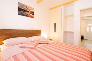 Łóżko lub łóżka w pokoju w obiekcie Apartment in Silo - Insel Krk 39710
