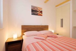 Łóżko lub łóżka w pokoju w obiekcie Apartment in Silo - Insel Krk 39710