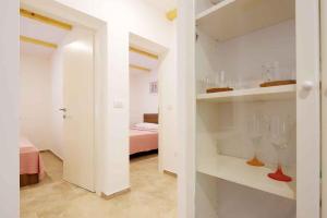 Łóżko lub łóżka w pokoju w obiekcie Apartment in Silo - Insel Krk 39710