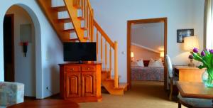 TV a/nebo společenská místnost v ubytování Appartment-Hotel-Hölzl
