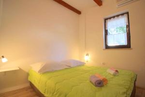 Posteľ alebo postele v izbe v ubytovaní Apartment in Funtana - Istrien 12232