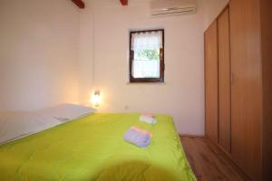 Posteľ alebo postele v izbe v ubytovaní Apartment in Funtana - Istrien 12232