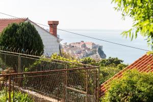 a view of the ocean from a house at B&B Villa Dubrovnik Garden in Dubrovnik