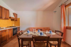 Kuchyňa alebo kuchynka v ubytovaní Holiday home Budoni - Insel Sardinien 27735