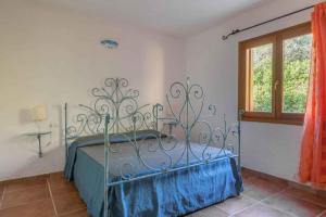 Posteľ alebo postele v izbe v ubytovaní Holiday home Budoni - Insel Sardinien 27735 + 13 fotografií