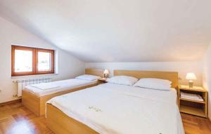 Postel nebo postele na pokoji v ubytování Apartment in Senj 17249