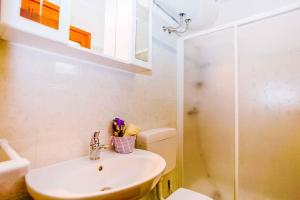A bathroom at Holiday home in Bibione 24612