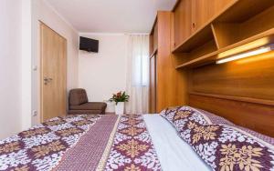 Posteľ alebo postele v izbe v ubytovaní Apartment in Vrbnik - Insel Krk 35843