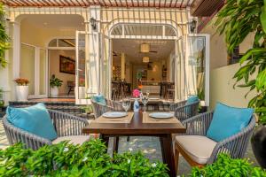 Posezení v ubytování Hoi An Merrily De Art Hotel