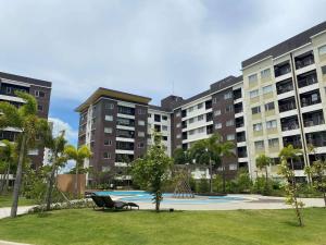 Bazén v ubytování Avida Atria Khalexa's Place Iloilo nebo v jeho okolí