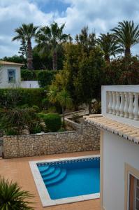 A view of the pool at Quinta da Floresta – Santo António Villas, Golf & Spa or nearby