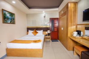 Postel nebo postele na pokoji v ubytování Oliver Hotel