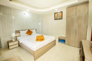 Postel nebo postele na pokoji v ubytování Oliver Hotel