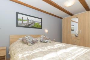 Łóżko lub łóżka w pokoju w obiekcie Spacious holiday home Guran