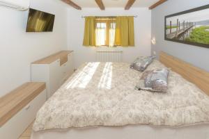 Łóżko lub łóżka w pokoju w obiekcie Spacious holiday home Guran