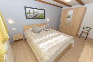 Łóżko lub łóżka w pokoju w obiekcie Spacious holiday home Guran