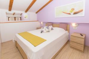 Łóżko lub łóżka w pokoju w obiekcie Spacious holiday home Guran