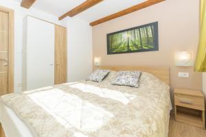 Łóżko lub łóżka w pokoju w obiekcie Spacious holiday home Guran