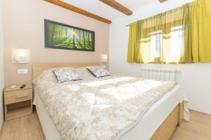 Łóżko lub łóżka w pokoju w obiekcie Spacious holiday home Guran