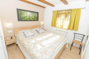 Łóżko lub łóżka w pokoju w obiekcie Spacious holiday home Guran